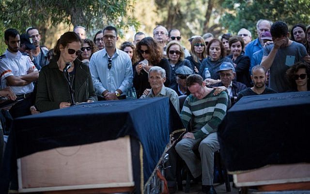 Shiri Nir, widow and mother of Omri and Elai Nir, a father and son killed during a hike in Nahal Tzeelim, mourns at their funeral in Kfar Vitkin on December 12, 2016. Hadas Parush/FLASH90) Shiri Nir, widow and mother of Omri and Elai Nir, a father and son killed during a hike in Nahal Tzeelim, mourns at their funeral in Kfar Vitkin on December 12, 2016. Hadas Parush/FLASH90)