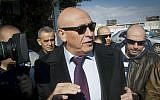 MK Basel Ghattas arrives at the Israel Police's Lahav 433 special investigation unit in Lod, December 20, 2016, for questioning. (Roy Alima/Flash90)