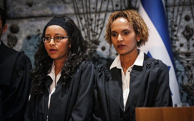 New Ethiopian Israeli judges Esther Tapta Geradi and Adenko Sabhat Haimovich take part in a swearing-in ceremony for newly appointed judges at the President's Residence in Jerusalem, on December 20, 2016. (Photo by Yossi Zamir/Flash90)
