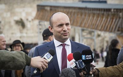 Education Minister and Jewish Home party leader Naftali Bennett delivers a statement to the press in response to the UN vote against Israeli settlements, at the Western Wall in Jerusalem's Old City, on December 25, 2016. (Hadas Parush/Flash90)