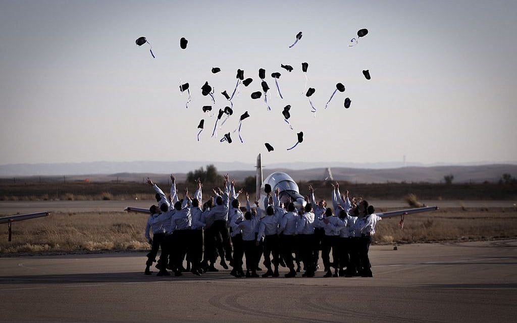 Israeli Air Force new pilots throw their hats in the air during their graduation ceremony at the Hatzerim Air Base in the Negev Desert on December 29, 2016. (Photo by Miriam Alster/Flash90) Israeli Air Force new pilots throw their hats in the air during their graduation ceremony at the Hatzerim Air Base in the Negev Desert on December 29, 2016. (Photo by Miriam Alster/Flash90)