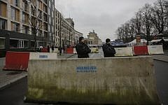 Illustrative: Armed police officers stand behind concrete blocks for protection near the Brandenburg Gate in Berlin, December 23, 2016 (AP Photo/Markus Schreiber)