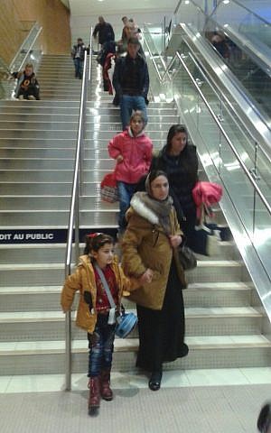 Two Yazidi families being greeted by local volunteers after a privately sponsored mission called Operation Ezra brought them to Winnipeg, Manitoba on December 20, 2016 (Nafiya Naso) Two Yazidi families being greeted by local volunteers after a privately sponsored mission called Operation Ezra brought them to Winnipeg, Manitoba on December 20, 2016 (Nafiya Naso)