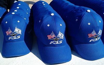 Baseball caps handed out during a ceremony to make the arrival of Israel's first two F-35 fighter jets on December 12, 2016. (Judah Ari Gross/Times of Israel) Baseball caps handed out during a ceremony to make the arrival of Israel's first two F-35 fighter jets on December 12, 2016. (Judah Ari Gross/Times of Israel)