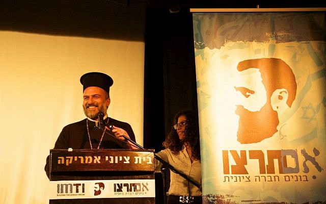Father Gabriel Naddaf speaking on December 11, 2016, at the fourth annual Im Tirtzu 'Zionist Conference for Human Rights' in Tel Aviv. (Dov Lieber / Times of Israel) 
