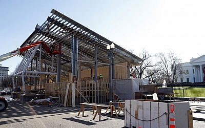Construction continues on the presidential reviewing stand on Pennsylvania Avenue in front of the White House in Washington, December 1, 2016. (AP Photo/Alex Brandon)