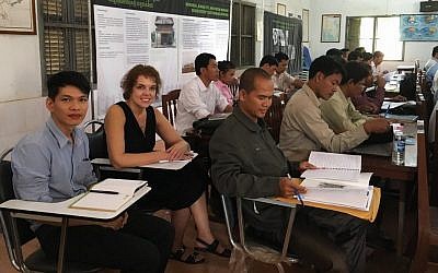 Kelly Watson from the Educators’ Institute for Human Rights sits in a classroom of Cambodian history teachers she is teaching the Holocaust to in October 2016. (courtesy Ouch Makara/Documentation Center of Cambodia Archives)