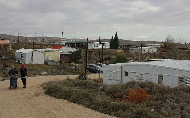 Women walking in the Amona outpost on December 15, 2016. (Judah Ari Gross/Times of Israel)