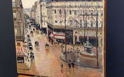 This Sept. 22, 2014 photo made available by Professor Jonathan Petropolous shows Camille Pissarro's 1897 Impressionist masterpiece, "Rue Saint-Honoré, dans l'après-midi. Effet de pluie," during an examination at the Museo Thyssen-Bornemisza in Madrid. (Jonathan Petropolous via AP)