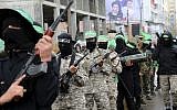Masked Palestinian terrorists from the Izzedine al-Qassam Brigades, a military wing of Hamas, commemorate the 29th anniversary of their group, in Gaza City, Wednesday, Dec. 14, 2016.  (AP Photo/Adel Hana)