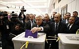 Palestinian Authority President Mahmud Abbas casts a vote at the Muqataa, the Palestinian Authority headquarters, in the city of Ramallah, West Bank, December 3, 2016. (Ahmad Gharabli/Pool photo via AP)