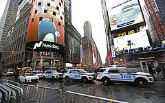 A row of New York City police cars is parked along a street in Times Square, Thursday, December 29, 2016, in New York. (AP/Kathy Willens)