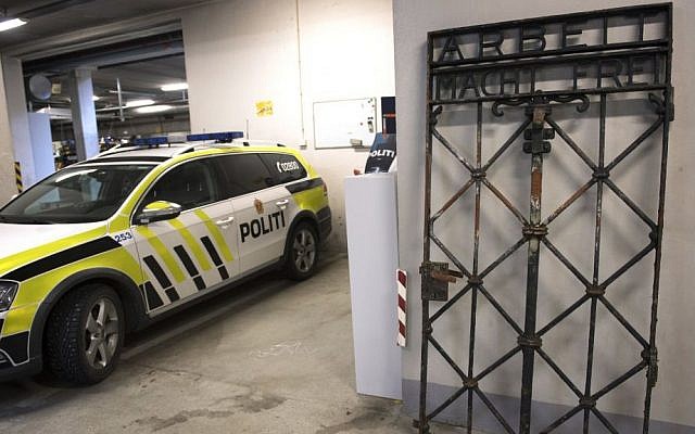The iron gate from the former Nazi concentration camp in Dachau, southern Germany, with the slogan "Arbeit macht frei" ("Work will set you free") is displayed Saturday Dec. 3, 2016, after being found earlier this week by police in Bergen, Norway. (Marit Hommedal / NTB scanpix via AP) The iron gate from the former Nazi concentration camp in Dachau, southern Germany, with the slogan "Arbeit macht frei" ("Work will set you free") is displayed Saturday Dec. 3, 2016, after being found earlier this week by police in Bergen, Norway. (Marit Hommedal / NTB scanpix via AP)