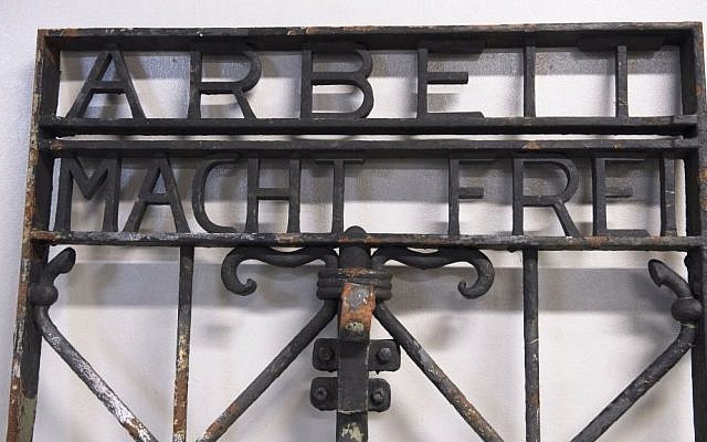 The iron gate from the former Nazi concentration camp in Dachau, southern Germany, with the slogan 'Arbeit macht frei' ('Work will set you free') is displayed Saturday Dec. 3, 2016, after being found earlier this week by police in Bergen, Norway. (Marit Hommedal/NTB scanpix via AP) The iron gate from the former Nazi concentration camp in Dachau, southern Germany, with the slogan 'Arbeit macht frei' ('Work will set you free') is displayed Saturday Dec. 3, 2016, after being found earlier this week by police in Bergen, Norway. (Marit Hommedal/NTB scanpix via AP)