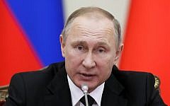 In this Monday, Dec. 26, 2016 file photo Russian President Vladimir Putin speaks at the meeting in St.Petersburg, Russia. President Vladimir Putin said, Friday, Dec. 30, 2016 that Russia will not be expelling US diplomats in response to a new round of US sanctions. (AP Photo/Dmitri Lovetsky, File)