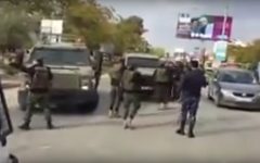 PA security forces apparently preventing IDF vehicles from entering the city of Jenin on December 11, 2016. (Screen capture: Ma'an news)