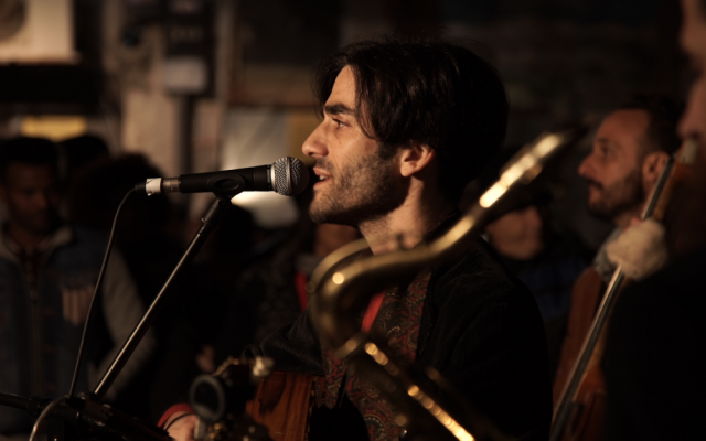 Musicians perform at the Nightlight festival in the Neve Sha'anan neighborhood in south Tel Aviv, December 24, 2016. (Luke Tress/Times of Israel)