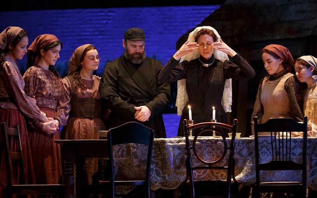 Candlelighting for Shabbat in the current Broadway production of 'Fiddler on the Roof.' Jessica Hecht (center) plays Golde. (Joan Marcus) Candlelighting for Shabbat in the current Broadway production of 'Fiddler on the Roof.' Jessica Hecht (center) plays Golde. (Joan Marcus)
