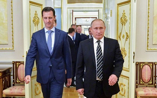 File: Russian President Vladimir Putin, right, and Syria President Bashar Assad arrive for a meeting in the Kremlin in Moscow, Russia, October 20, 2015. (Alexei Druzhinin, RIA-Novosti, Kremlin Pool Photo via AP, File) File: Russian President Vladimir Putin, right, and Syria President Bashar Assad arrive for a meeting in the Kremlin in Moscow, Russia, October 20, 2015. (Alexei Druzhinin, RIA-Novosti, Kremlin Pool Photo via AP, File)
