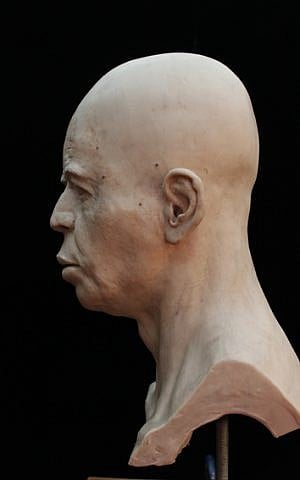 The final reconstructed Jericho skull head from the side. The effect of the head-binding is just visible. (Copyright Trustees of the British Museum, photo by RN DS partnership)