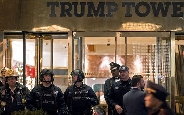 New York firefighters, police officers and others stand outside Trump Tower lobby in New York, Tuesday, Dec 27, 2016. Police hastily cleared the lobby of Trump Tower on Tuesday to investigate an unattended backpack, only to find that the bag contained children's toys. (AP/Craig Ruttle) New York firefighters, police officers and others stand outside Trump Tower lobby in New York, Tuesday, Dec 27, 2016. Police hastily cleared the lobby of Trump Tower on Tuesday to investigate an unattended backpack, only to find that the bag contained children's toys. (AP/Craig Ruttle)