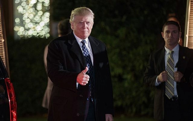 US President-elect Donald Trump arriving at a party at the home of Robert Mercer, one of Trump's biggest campaign donors, December 3, 2016. (AP Photo/Evan Vucci) US President-elect Donald Trump arriving at a party at the home of Robert Mercer, one of Trump's biggest campaign donors, December 3, 2016. (AP Photo/Evan Vucci)