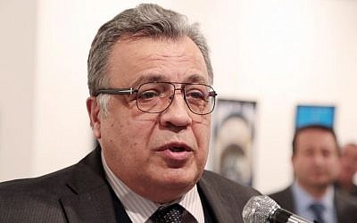 The Russian Ambassador to Turkey Andrei Karlov speaks at a gallery in Ankara Monday Dec. 19, 2016. (AP Photo/Burhan Ozbilici) 