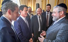 Manuel Valls, second from left, hosting a delegation of the Conference of European Rabbis at his office in May 2015. (Eli Itkin/Conference of European Rabbis)