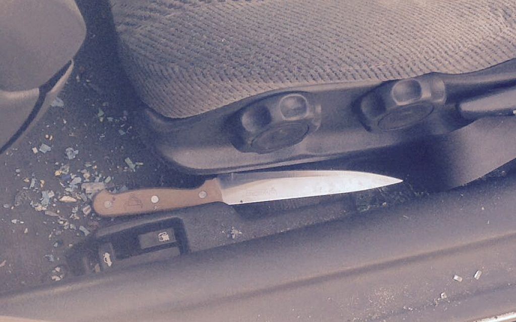 The knife police said female resident of the East Jerusalem neighborhood of Beit Hanina had in her position during a suspected car-ramming attack at the Qalandiya checkpoint in the West Bank. (Police spokesperson) The knife police said female resident of the East Jerusalem neighborhood of Beit Hanina had in her position during a suspected car-ramming attack at the Qalandiya checkpoint in the West Bank. (Police spokesperson)