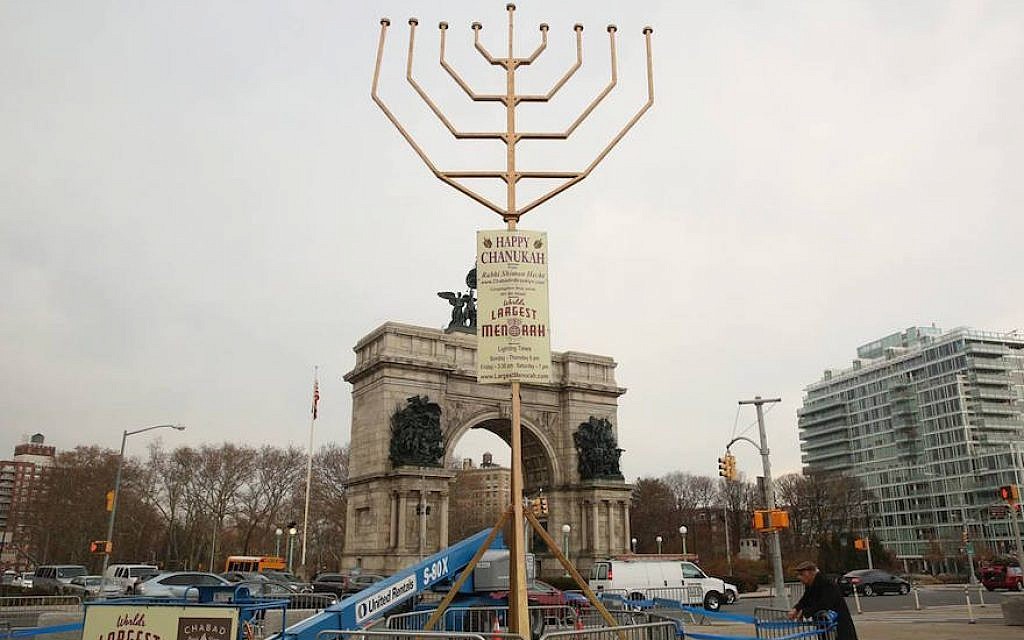 The Chabad menorah at Grand Army Plaza, whose candles reach 33 and a half feet in the air, is technically taller than its Manhattan rival. (Facebook) The Chabad menorah at Grand Army Plaza, whose candles reach 33 and a half feet in the air, is technically taller than its Manhattan rival. (Facebook)