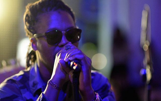 Lupe Fiasco performing at 'Born in Blue: Remixed and Reissued' exhibition opening in Los Angeles, Sept. 10, 2014. (Chris Weeks/Getty Images for Sonos) Lupe Fiasco performing at 'Born in Blue: Remixed and Reissued' exhibition opening in Los Angeles, Sept. 10, 2014. (Chris Weeks/Getty Images for Sonos)