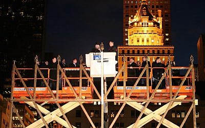 Jewish News Agency Menorah World's Largest Chanukah Menorah on Fifth Avenue by Central Park. Menorah Parade of 300 Menorah vehicles. Hot "Latkes" on Fifth Avenue. World's Largest Chanukah Menorah Lighted in 2013 by New York City Mayor Michael R. Bloomberg with Rabbi Shmuel M. Butman, Director Lubavitch Youth Organization. (PRNewsFoto/Jewish News Agency)