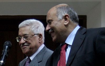 Fatah member Jibril Rajoub and Palestinian Authority President Mahmoud Abbas hold a joint news conference in the West Bank city of Ramallah October 26, 2008. (Issam Rimawi / Flash90)