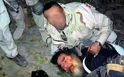 Former Iraqi president Saddam Hussein being arrested in late 2003, in a screenshot from a video uploaded to YouTube on December 17, 2016.