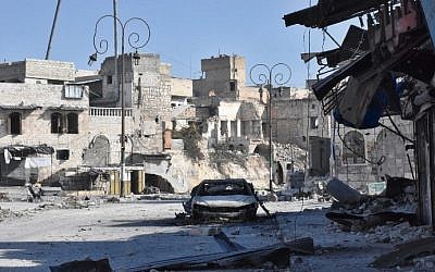 A picture taken on December 8, 2016, shows destroyed buildings in the Bab al-Hadid neighborhood, in Aleppo's Old City, after Syrian pro-government forces took control of the area. / AFP PHOTO / GEORGE OURFALIAN A picture taken on December 8, 2016, shows destroyed buildings in the Bab al-Hadid neighborhood, in Aleppo's Old City, after Syrian pro-government forces took control of the area. / AFP PHOTO / GEORGE OURFALIAN