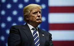 President-elect Donald Trump looks on during a rally at the DeltaPlex Arena, December 9, 2016, in Grand Rapids, Michigan. (Drew Angerer/Getty Images/AFP)