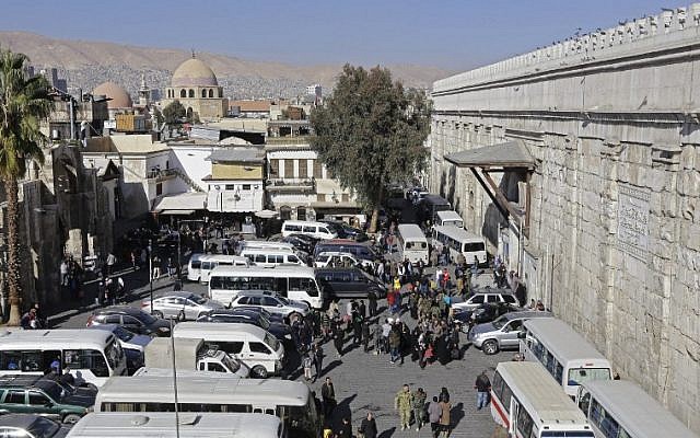 A general view shows a bus station outside the Hamidiyeh popular market in the old part of the capital Damascus on November 27, 2016. (AFP/LOUAI BESHARA) A general view shows a bus station outside the Hamidiyeh popular market in the old part of the capital Damascus on November 27, 2016. (AFP/LOUAI BESHARA)