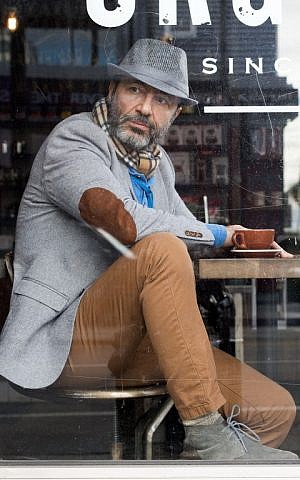 Syrian actor Jay Abdo poses in Hollywood, California, on December 22, 2016. (AFP PHOTO/VALERIE MACON)