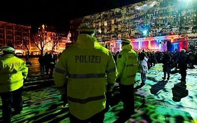 Policemen patrol on New Year's Eve at the Cologne Cathedral and main train station in Germany, on December 31, 2016. (Patrik Stollarz/AFP) Policemen patrol on New Year's Eve at the Cologne Cathedral and main train station in Germany, on December 31, 2016. (Patrik Stollarz/AFP)