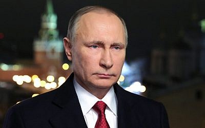 Russian President Vladimir Putin makes his New Year's address to the nation from the Kremlin in Moscow on December 31, 2016. (AFP/Sputnik/Mikhail Klimentiev)