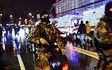 Turkish special force police officers and ambulances are seen at the site of an armed attack January 1, 2017 in Istanbul, Turkey. (AFP PHOTO/YASIN AKGUL)