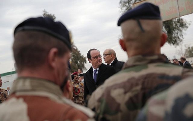 French President Francois Hollande addresses French soldiers at the Iraqi Counter Terrorism Service Academy at the Baghdad Airport Complex in Baghdad, January 2, 2017. (AFP/AP/Christophe Ena)