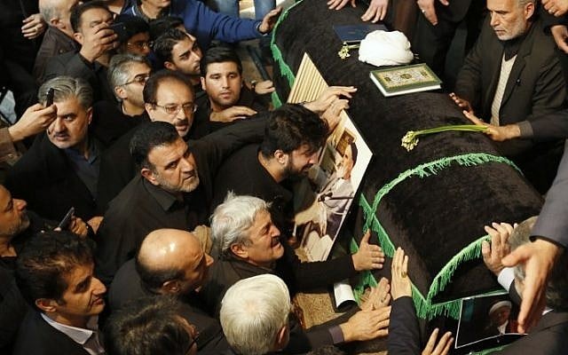 Mourners gather around the coffin of former Iranian president Akbar Hashemi Rafsanjani during a mourning ceremony at the Jamaran mosque in Tehran, on January 9, 2017. (AFP PHOTO / ATTA KENARE) Mourners gather around the coffin of former Iranian president Akbar Hashemi Rafsanjani during a mourning ceremony at the Jamaran mosque in Tehran, on January 9, 2017. (AFP PHOTO / ATTA KENARE)