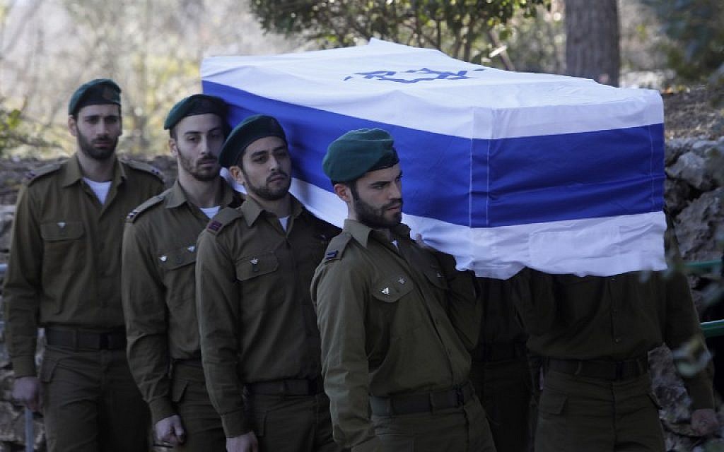 Members of the Israeli security forces carry the coffin of their comrade Lt. Shir Hajaj, 22, during her funeral at the military cemetery on Mount Herzl in Jerusalem on January 9, 2016, a day after she was killed by a Palestinian terrorist when he rammed his vehicle into a group of Israeli soldiers. (Menahem Kahana/AFP)