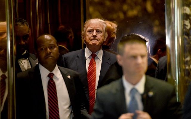 President-elect Donald Trump arrives gets off the elevator at Trump Tower January 9, 2017 in New York (AFP PHOTO / TIMOTHY A. CLARY) President-elect Donald Trump arrives gets off the elevator at Trump Tower January 9, 2017 in New York (AFP PHOTO / TIMOTHY A. CLARY)