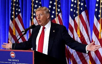 US President-elect Donald Trump speaks during a press conference January 11, 2017 at Trump Tower in New York.(AFP PHOTO / TIMOTHY A. CLARY)