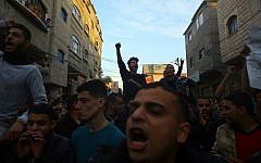 Palestinians chant slogans during a protest against the ongoing electricity crisis in Jabaliya refugee camp in the northern Gaza Strip on January 12, 2017. (AFP Photo/Mohammed Abed)