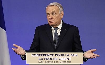 French Minister of Foreign Affairs Jean-Marc Ayrault addresses delegates at the opening of the Mideast peace conference in Paris on January 15, 2017. (AFP PHOTO / POOL / Thomas SAMSON)