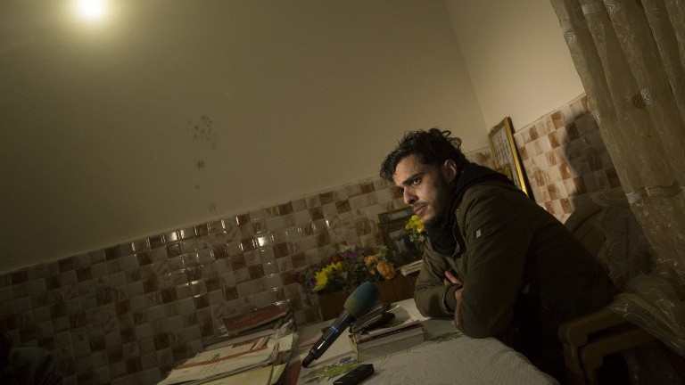 Palestinian activist Mohammed al-Taluli, 25, gives an interview with AFP in his home at the Jabaliya refugee camp in northern Gaza strip on January 16, 2017. (AFP Photo/Mahmud Hams) Palestinian activist Mohammed al-Taluli, 25, gives an interview with AFP in his home at the Jabaliya refugee camp in northern Gaza strip on January 16, 2017. (AFP Photo/Mahmud Hams)