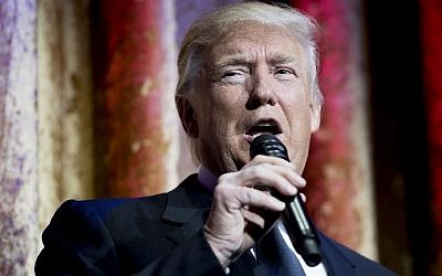 US President-elect Donald Trump speaks at the Chairman's Global Dinner in Washington, DC on January 17, 2017. (AFP Photo/Jim Watson)